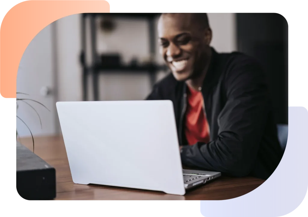 Motor dealer using his making tax digital software on a laptop